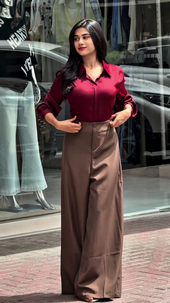 Step into effortless sophistication with this stunning Midnight Elegance Shirt & Luxe Beige  Palazzo Set 🖤✨ — a perfect combination of modern minimalism and classy fashion. Designed for women who love clean, polished looks, this outfit is your go-to choice for both formal and casual elegance 😍💫. The set features a sleek black button-down shirt 🖤👕 that exudes confidence and timeless charm. With its structured collar and full sleeves ✨, it delivers a refined and professional look, making it ideal for office wear 💼, meetings, or even evening outings 🌙. The smooth, lightweight fabric ensures comfort while maintaining a crisp, elegant finish 🌬️. Paired beautifully with high-waisted beige palazzo pants 🤍👖, this outfit creates a perfect contrast that feels both luxurious and stylish. The wide-leg silhouette 💃 adds graceful movement and enhances your overall look with a flowy, flattering fit. The high waist design cinches perfectly at the waist, giving a sleek and elongated appearance 🔥. This co-ord style outfit is incredibly versatile — dress it up with heels 👠 and statement accessories 💍 for a formal vibe, or keep it casual with flats 👡 for a relaxed yet chic day look ☕. Whether you're heading to work, brunch, or a classy outing, this set ensures you stand out with elegance 🌟. 💥 Why You’ll Love It: Classic black shirt with a polished look 🖤 Elegant beige wide-leg palazzo pants 🤍 Comfortable, breathable fabric 🌬️ Perfect for office, casual & formal wear 💼 Flattering high-waist and flowy silhouette 💃 🎨 Available in Multiple Designs & Colours: Explore a variety of colors, fabrics, and style options 🌈 to suit your personality 💖 📏 Sizes Available – XXS to XXL: Inclusive sizing for all body types 🤗 ensuring a perfect fit 💯 🧼 Easy Care & Premium Quality: Durable and easy to maintain for everyday wear 🧺 ✨ Add this timeless outfit to your wardrobe and elevate your style with confidence, class, and effortless charm 🖤🤍