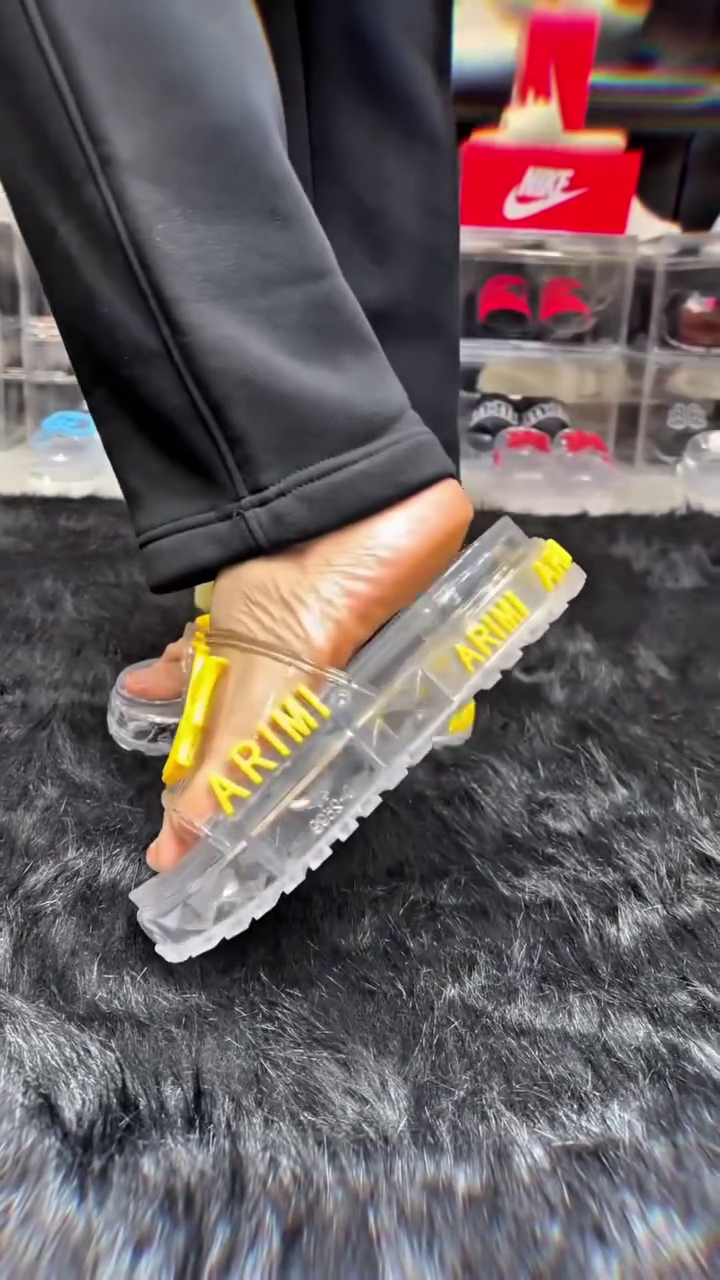 Transparent Clear Platform Slide Sandals Featuring Bold Red Trefoil Logo Straps and Grooved Soles 🩴