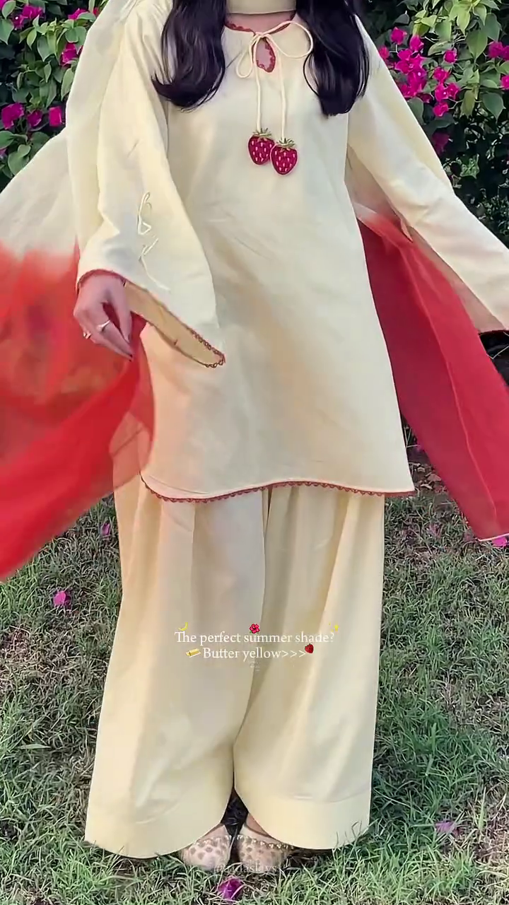 Elegant Butter Yellow Cotton Ethnic Suit Set Featuring Tie-Up Neckline with Strawberry Tassels and Matching Wide-Leg Palazzos 🍓
