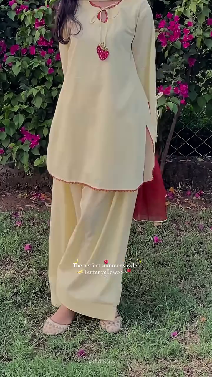 Elegant Butter Yellow Cotton Ethnic Suit Set Featuring Tie-Up Neckline with Strawberry Tassels and Matching Wide-Leg Palazzos 🍓