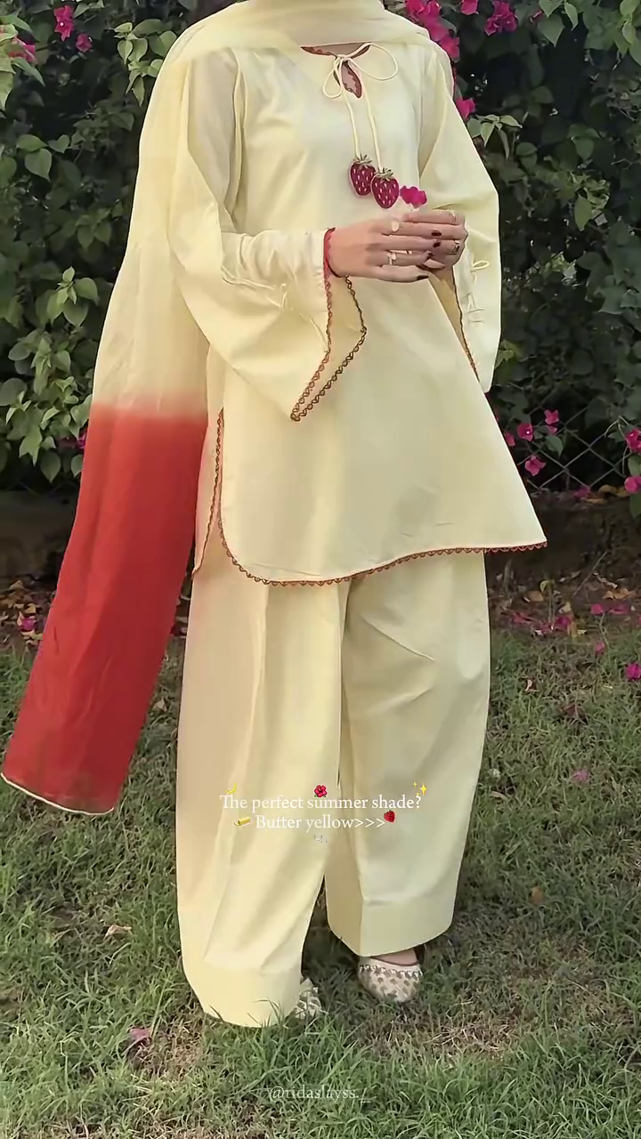 Elegant Butter Yellow Cotton Ethnic Suit Set Featuring Tie-Up Neckline with Strawberry Tassels and Matching Wide-Leg Palazzos 🍓
